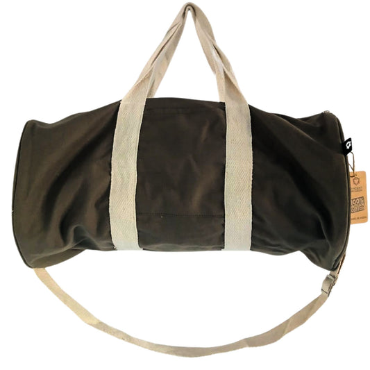 Brown duffel bag with beige handles and strap on a white background