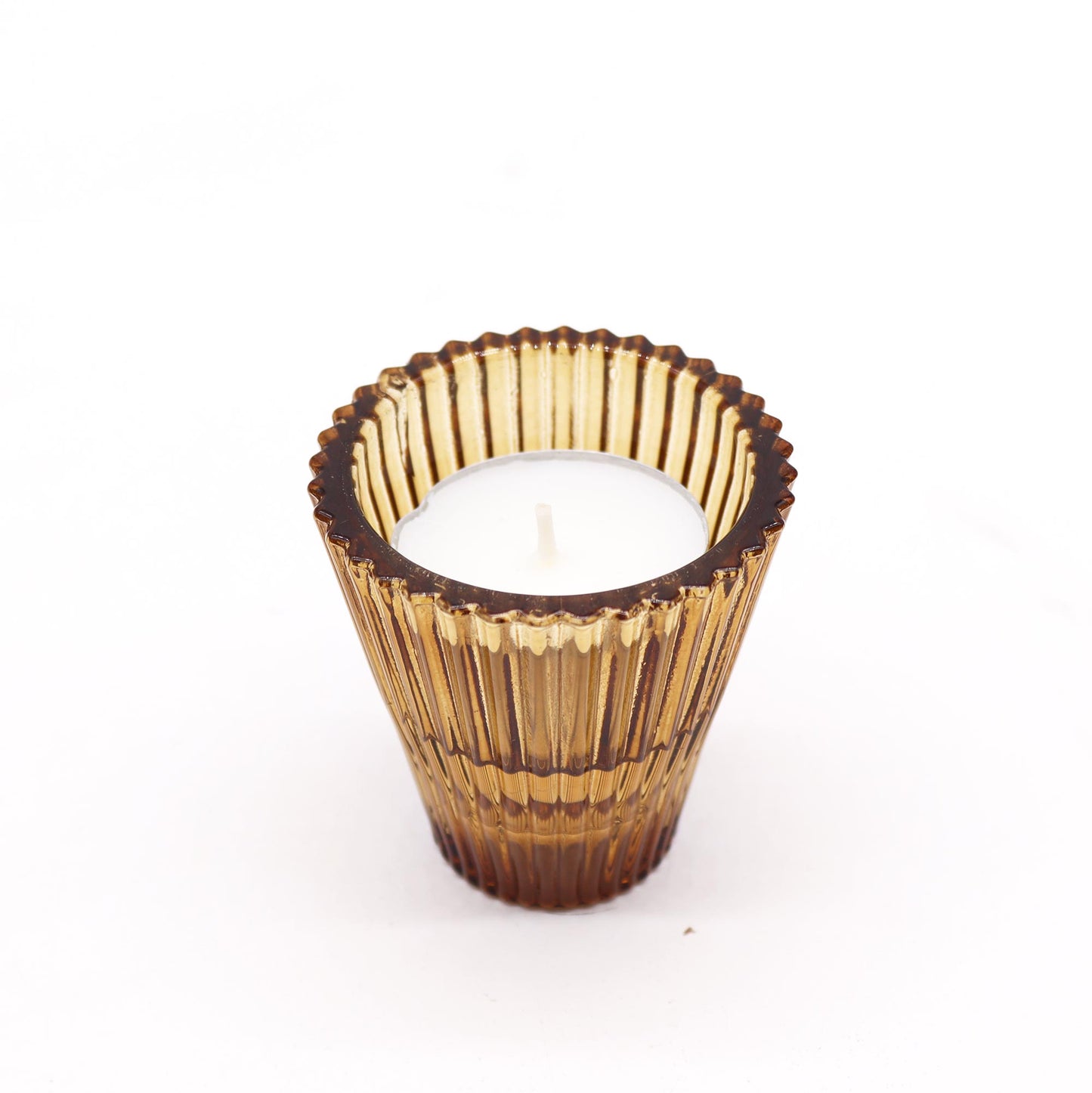 Add a touch of versatility and elegance to your home with the Flip Dinner Candle / Tealight Holder in Antique Amber. Expertly crafted from high-quality glass,