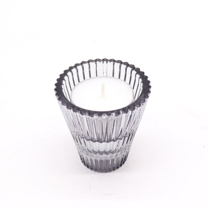 Add a touch of versatility and elegance to your home with the Flip Dinner Candle / Tealight Holder in Midnight Grey. Expertly crafted from high-quality glass
