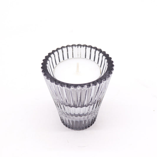 Add a touch of versatility and elegance to your home with the Flip Dinner Candle / Tealight Holder in Midnight Grey. Expertly crafted from high-quality glass