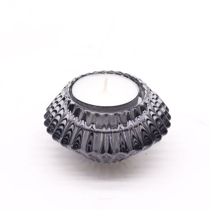 Add a touch of versatility and elegance to your home with the Flower Flip Dinner Candle / Tealight Holder in Midnight Grey. 