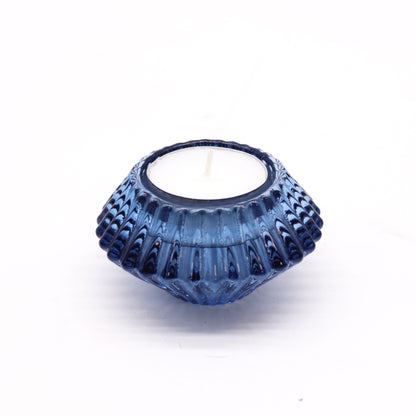 Add a touch of versatility and elegance to your home with the Flower Flip Dinner Candle / Tealight Holder in Royal Blue. Expertly crafted from high-quality glass