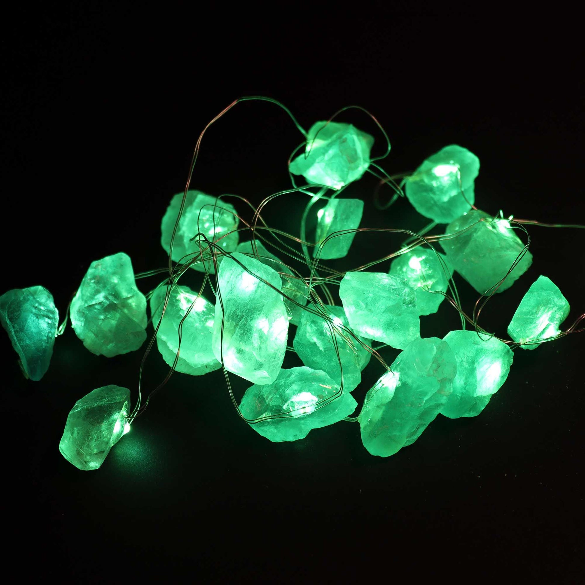 String of green LED lights on a black background