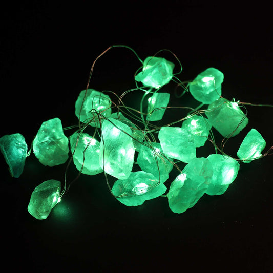 String of green LED lights on a black background