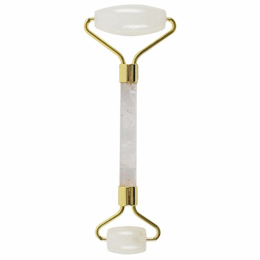 Facial roller with gold accents and white roller heads on a white background