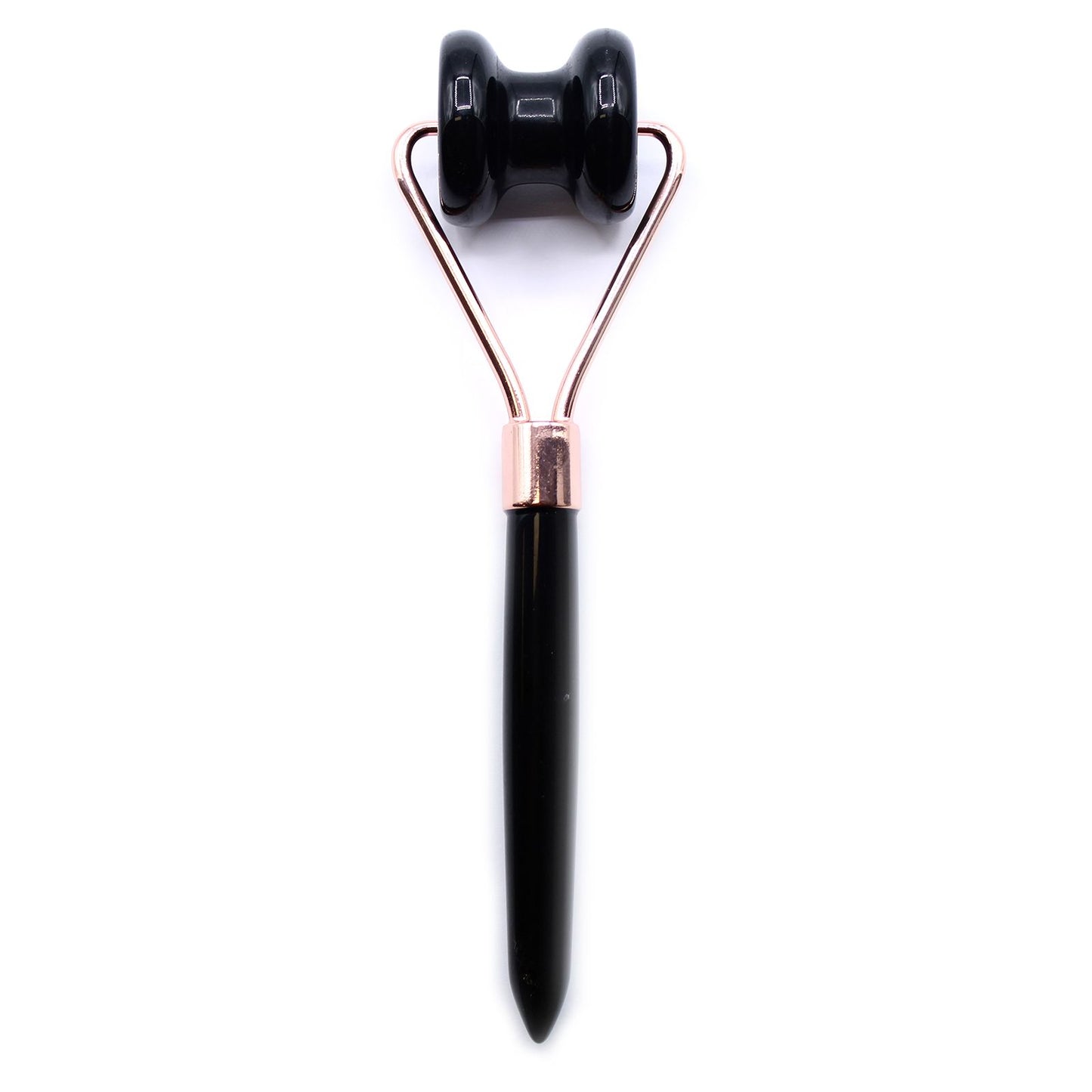 Black and rose gold facial roller on a white background