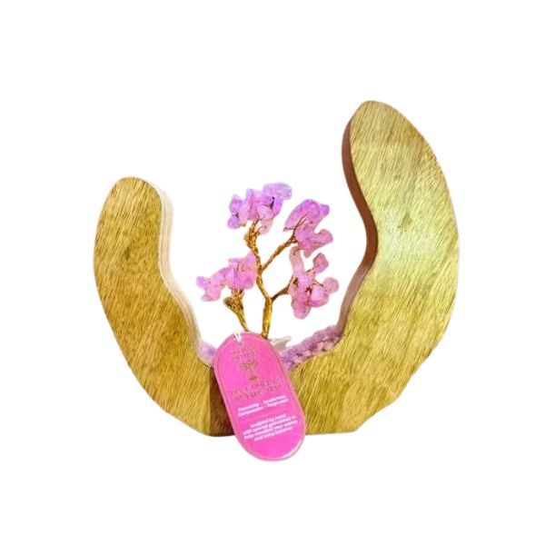 Wooden product with pink coral-like structure and a pink tag on a white background