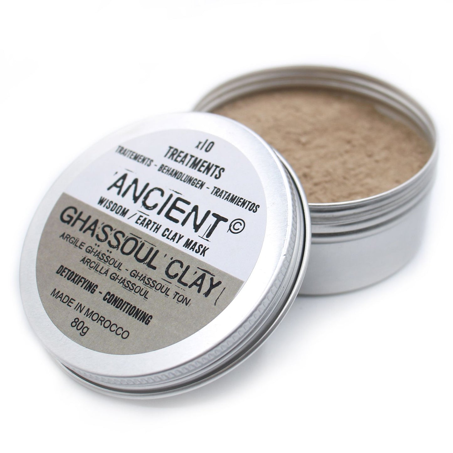 Open container of Ghassoul Clay mask with visible label on a white background