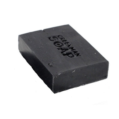 Black soap bar with 'Greenman Soap' branding on a white background