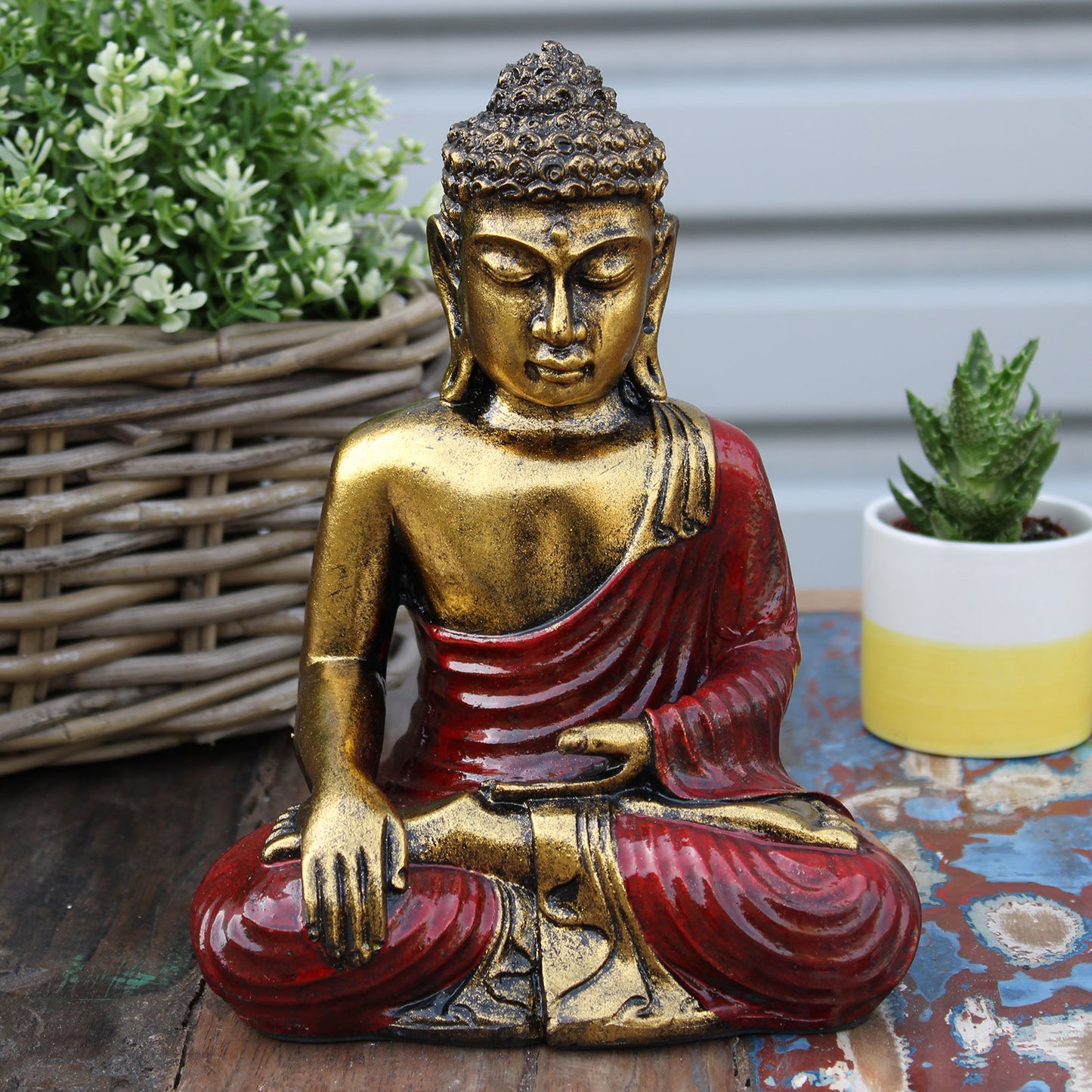 Add a touch of peace and serenity to your space with this exquisite Hand Painted Red &amp; Gold Large Buddha Statue. back view
