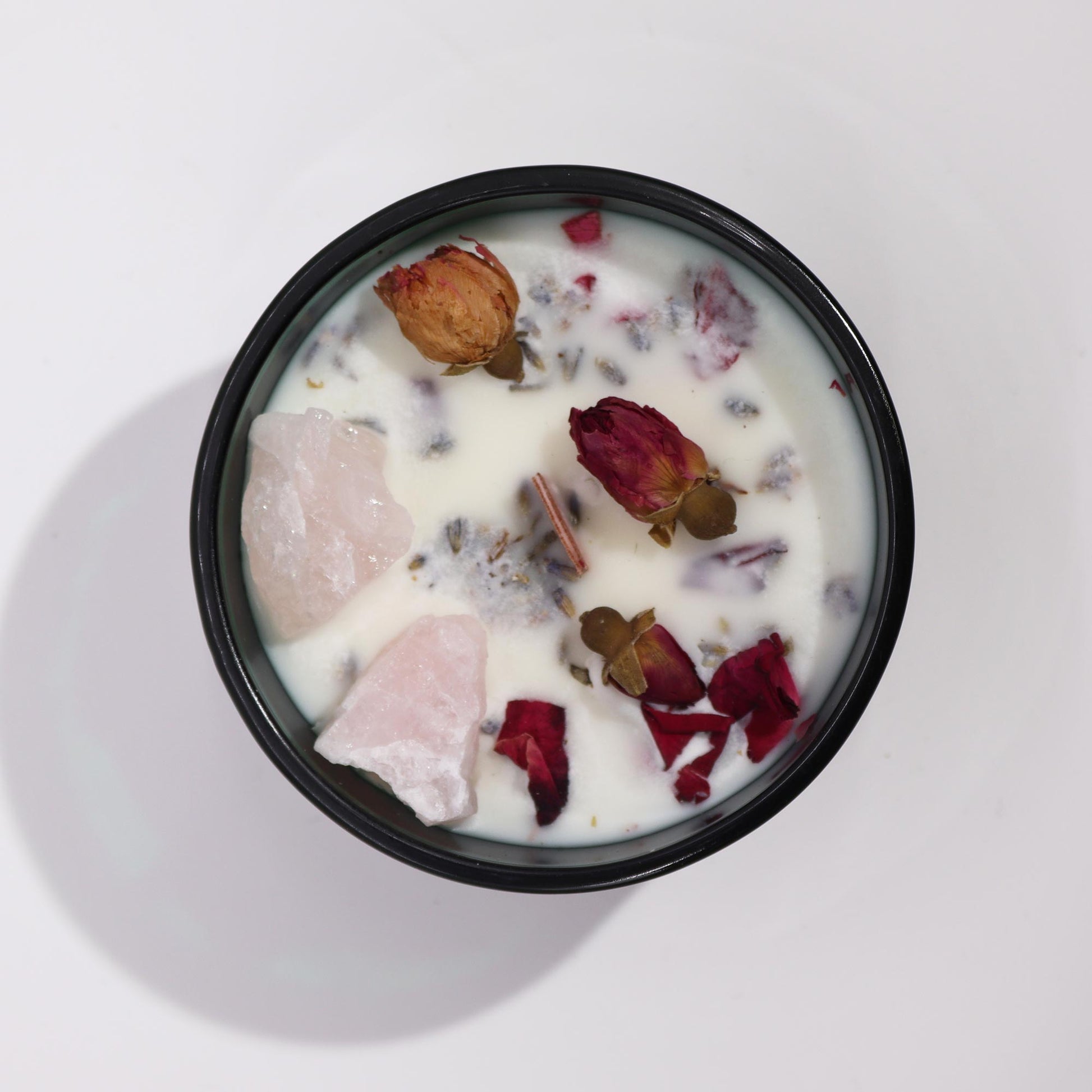 Hop Hare Crystal Magic Flower Candle The Lovers is housed in a striking dark green jar. 