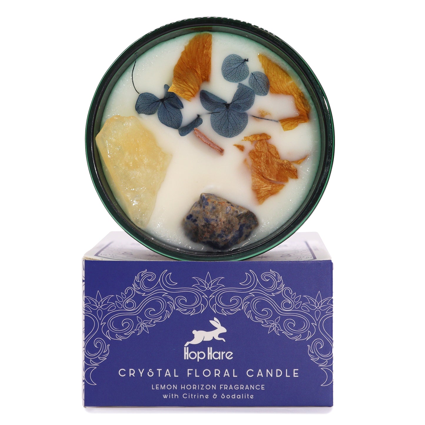 Housed in a striking dark green jar, the Hop Hare Crystal Magic Flower Candle boxed  The Sun radiates warmth, joy, and positivity.