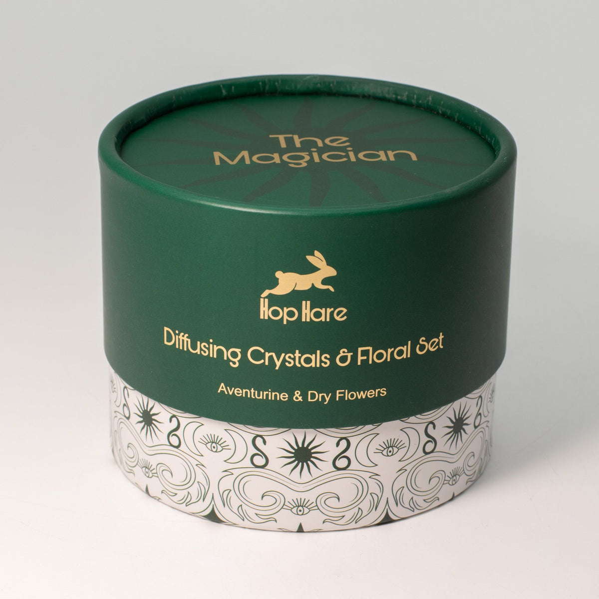 Green cylindrical container with 'The Magician' branding on a white background