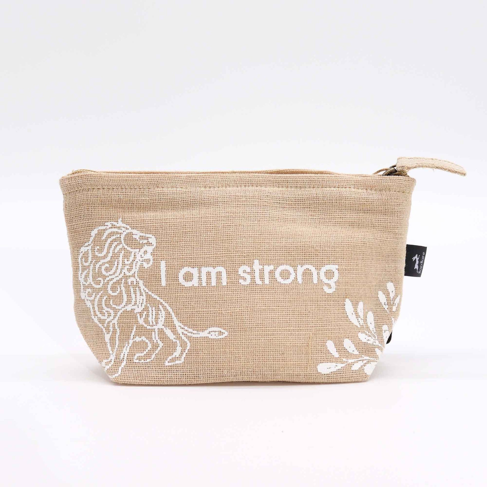 Beige pouch with a lion design and 'I am strong' text on a white background