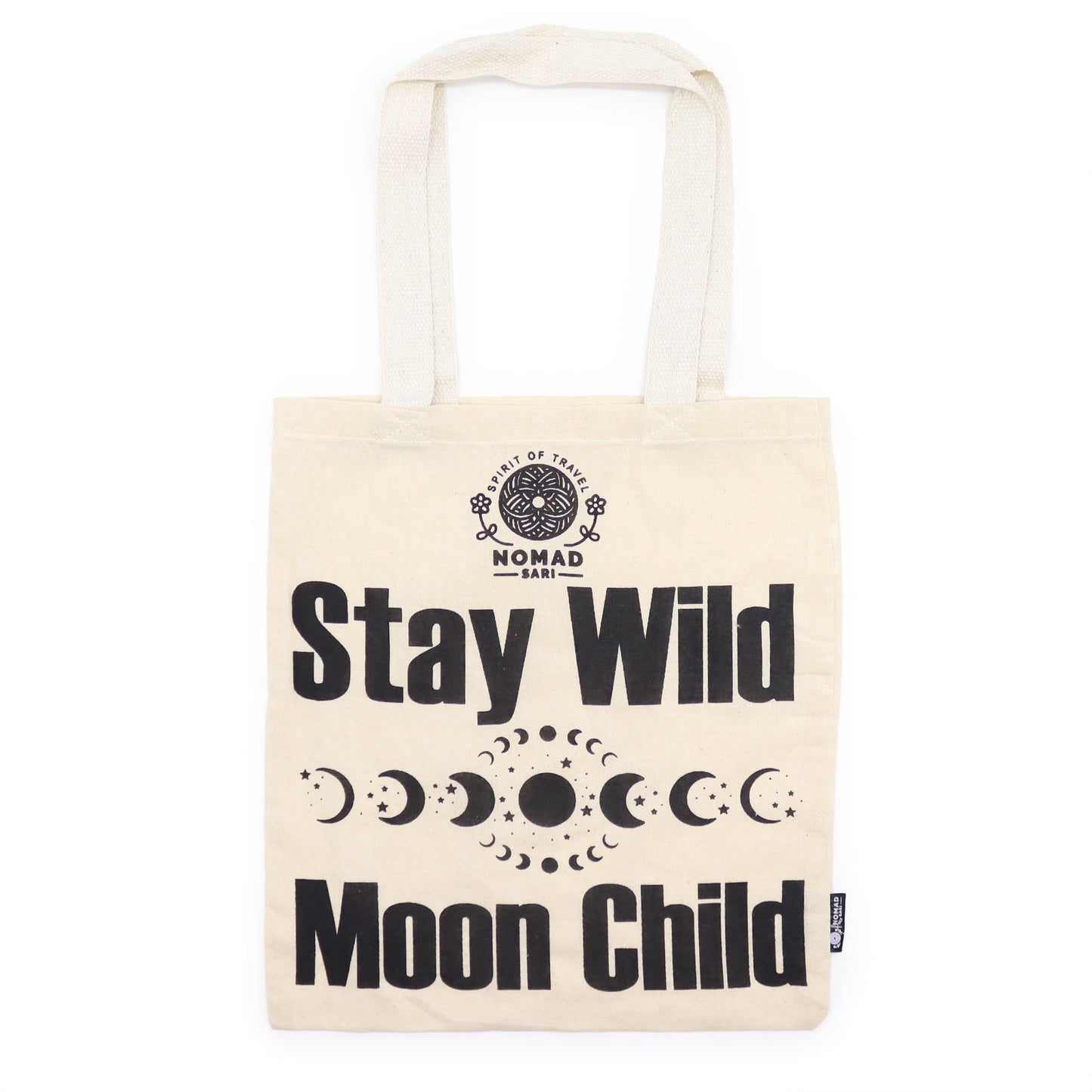 Beige tote bag with 'Stay Wild Moon Child' text and moon phases design on a white background