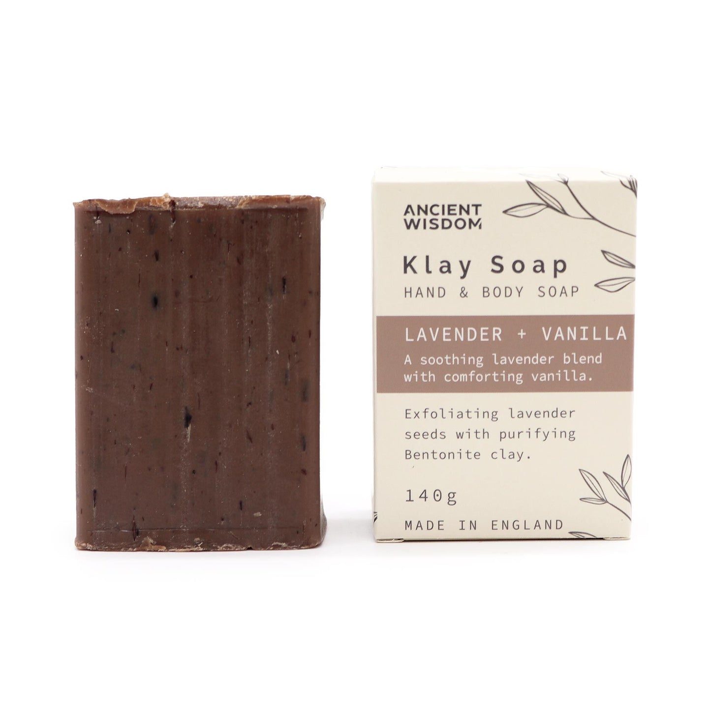 Bar of Klay Soap next to its packaging on a white background