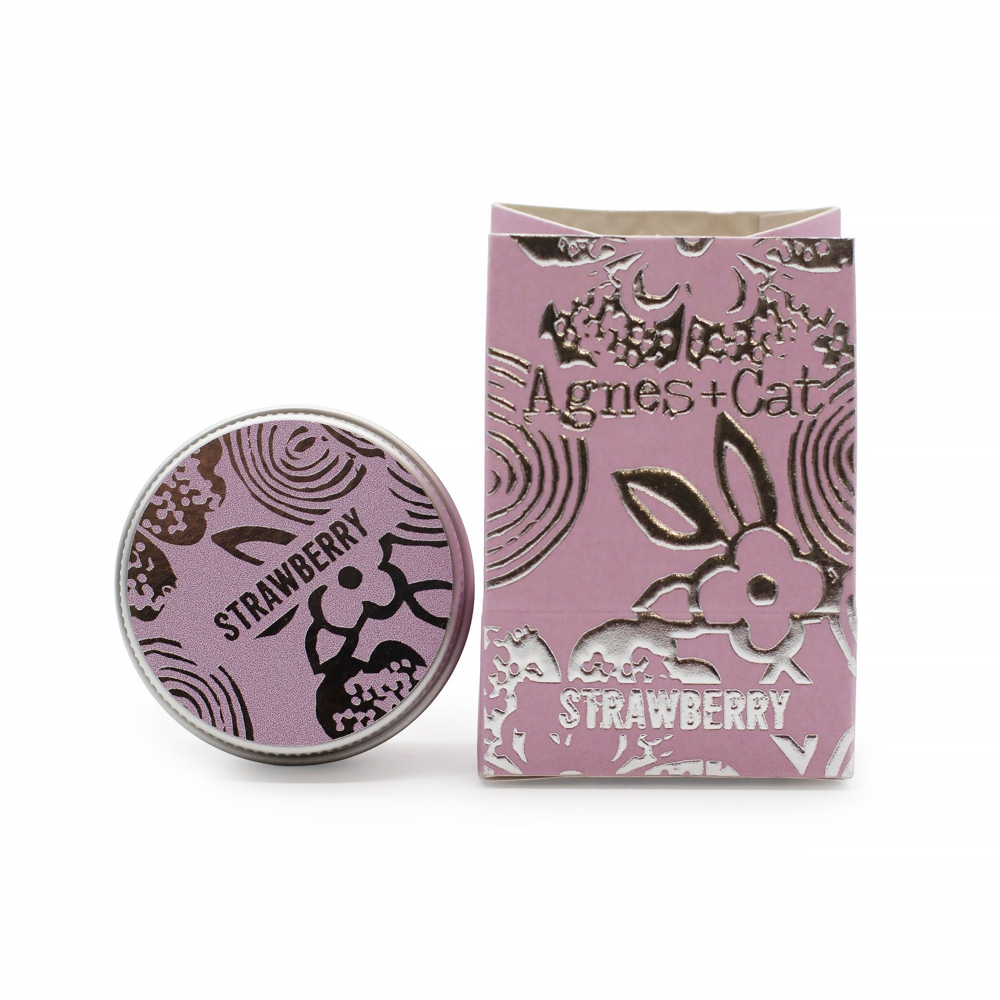 Pink and black 'Agnes + Cat' product with 'Strawberry' text on a white background