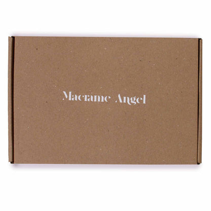 Brown cardboard box with 'Macrame Angel' branding on a white background