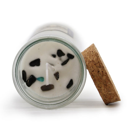 Magic spell candle Crafted to draw in good fortune, positive outcomes, and unexpected blessings. crystals