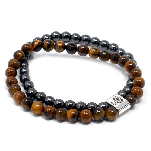Two beaded bracelets with black and brown beads on a white background