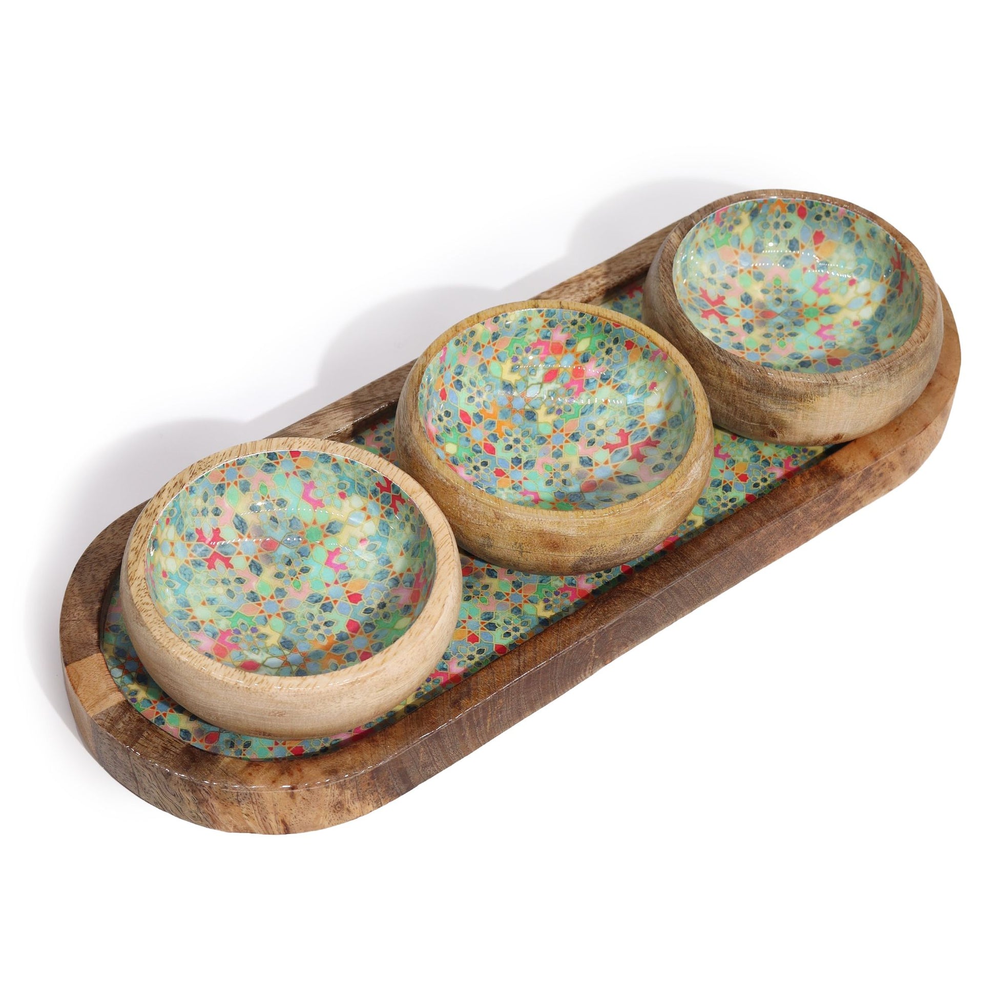 Three wooden bowls with colorful speckled design on a wooden tray