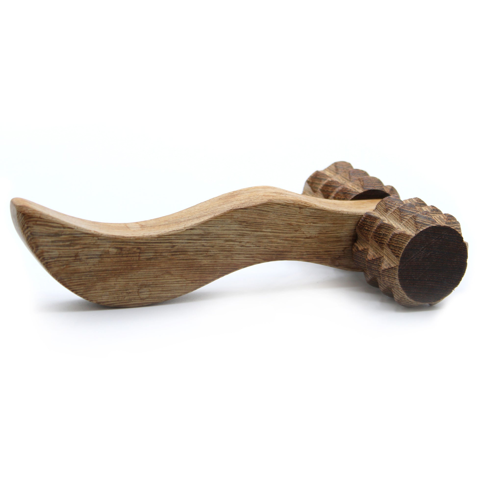 Wooden tool with a curved handle and round head on a white background