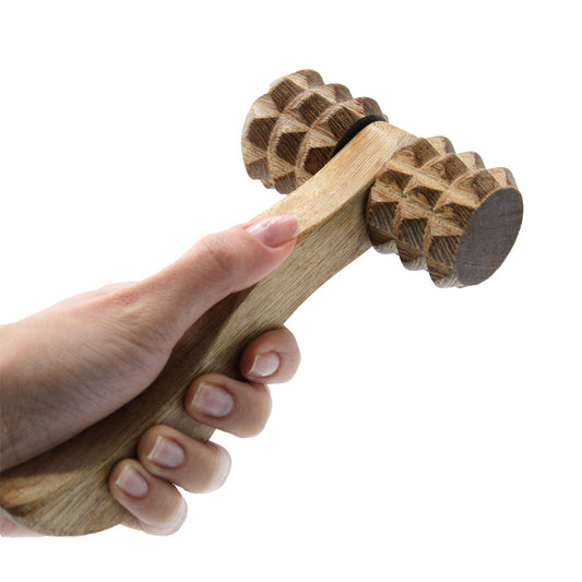 hand holding Massage Tool - Ribbed Hand Roller