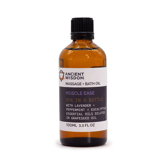 Bottle of Ancient Wisdom Muscle Ease massage and bath oil on a white background