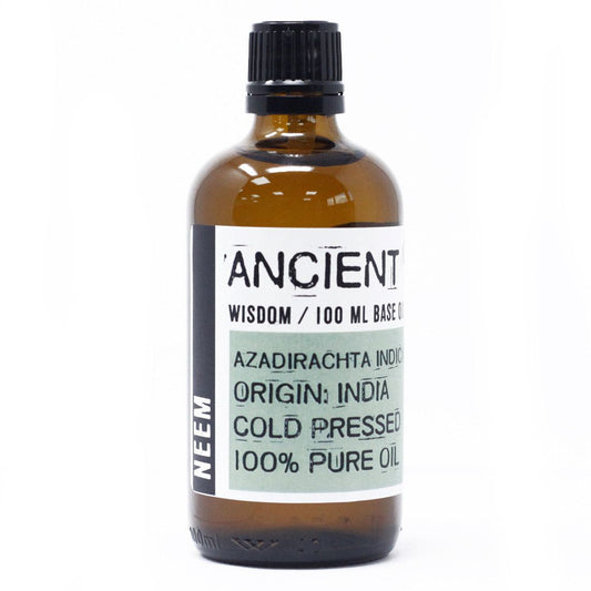 Bottle of neem oil with a label on a white background