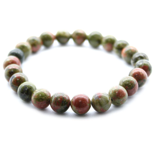 Multicolored beaded bracelet on a white background