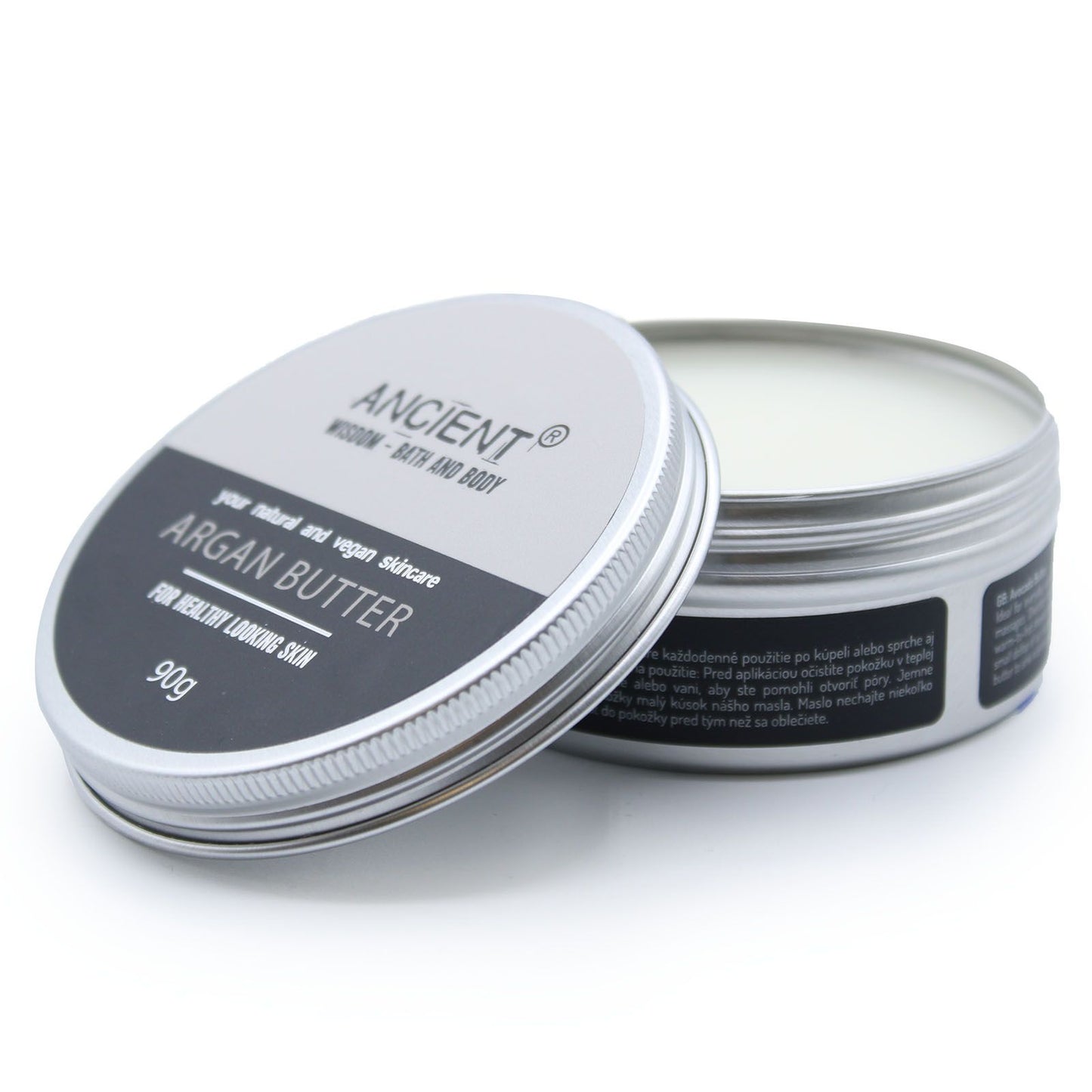 Open container of Ancient Argan Butter on a white background