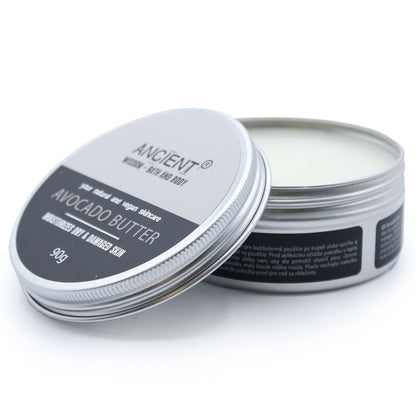 Avocado butter container with lid on a white background