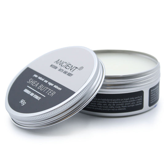 Two containers of shea butter with a visible brand name on a white background