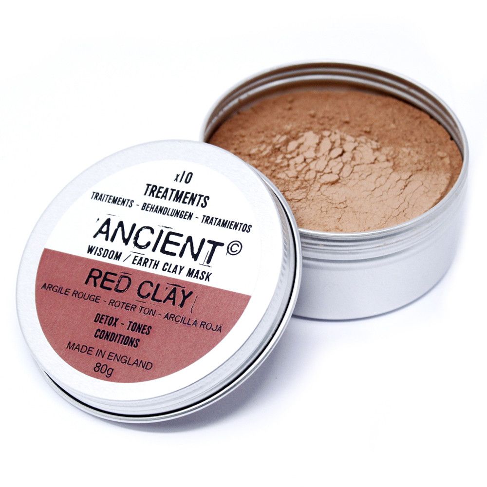 Open container of Ancient Wisdom Red Clay Mask with visible clay inside on a white background