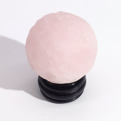 Bring a touch of cosmic beauty into your space with the Rose Quartz Planet Venus.