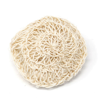 Round beige natural sponge on a white background