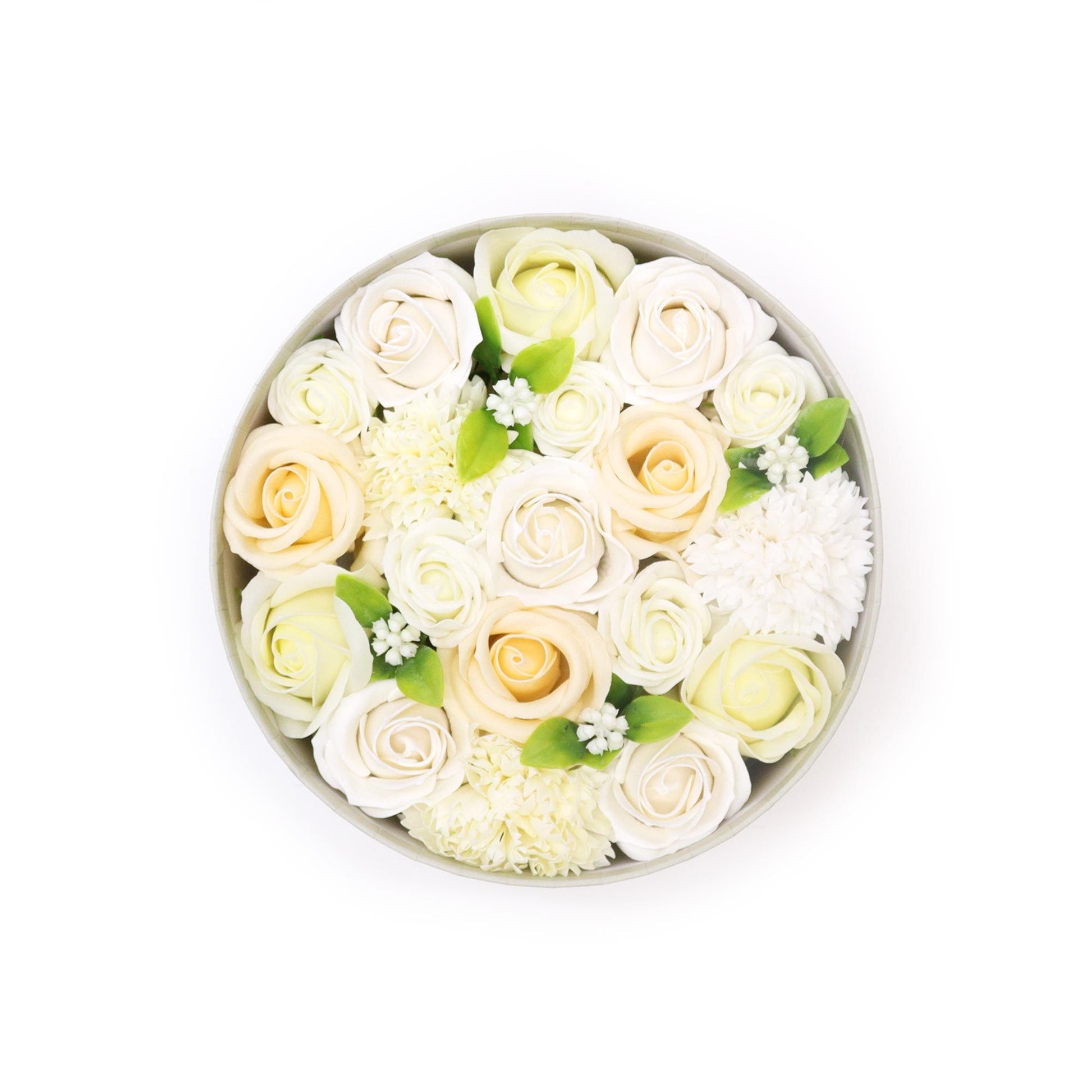 Round arrangement of white and light yellow roses in a box on a white background
