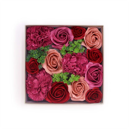 Square box filled with pink, red, and green flowers on a white background