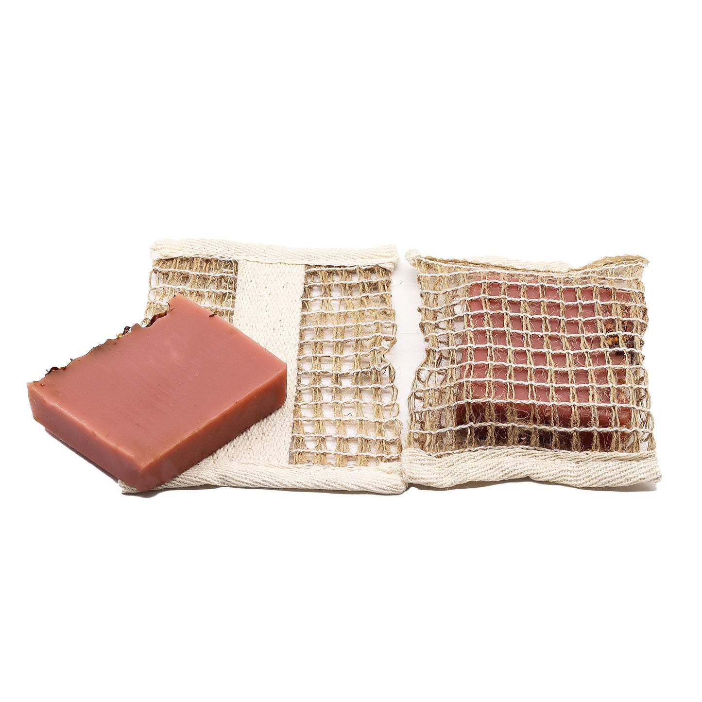 Two bars of soap in a mesh bag on a white background