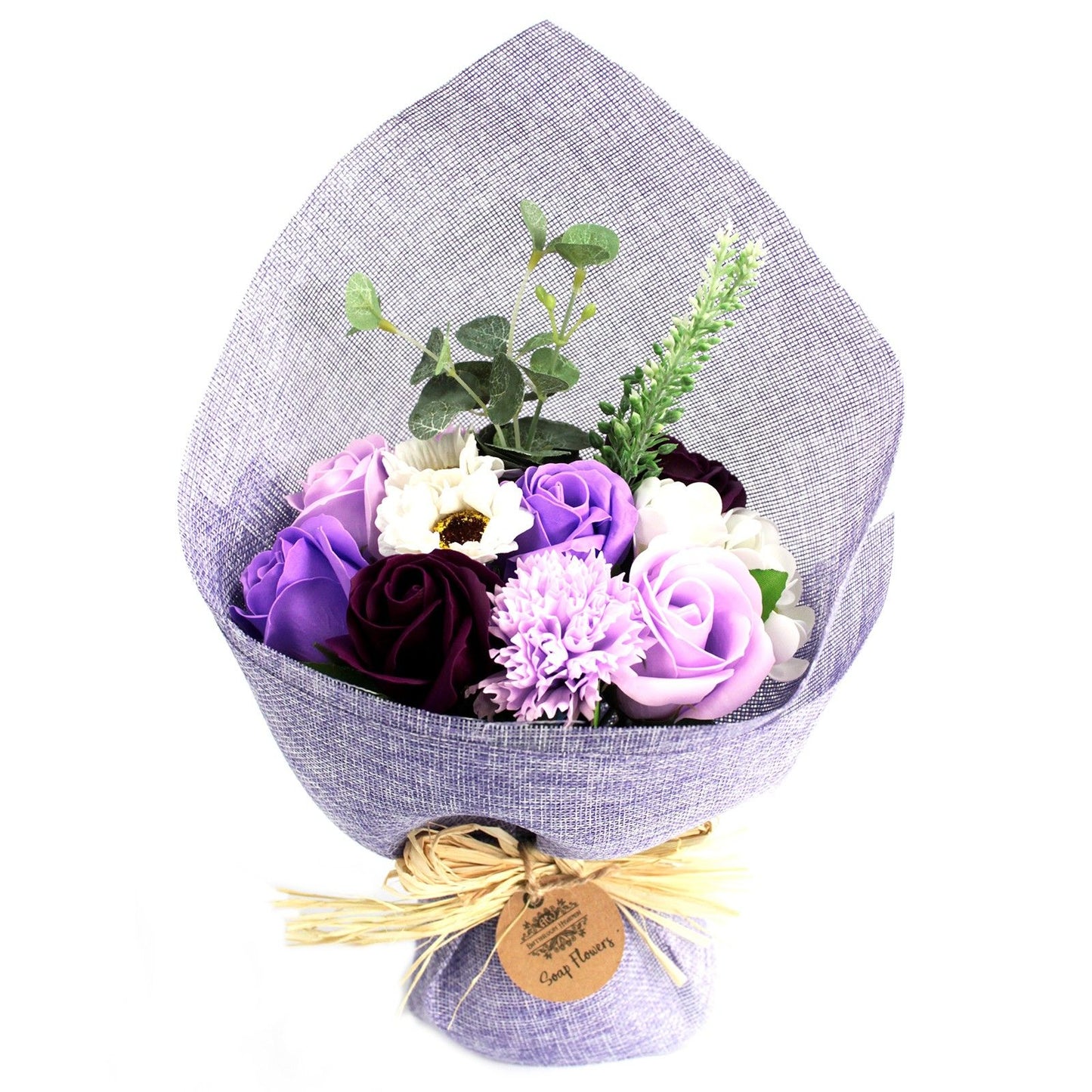 Bouquet of purple and white flowers wrapped in gray paper with a gold ribbon on a white background