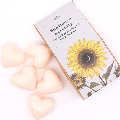 Sunflower-themed bath bomb packaging with heart-shaped bath bombs on a white background