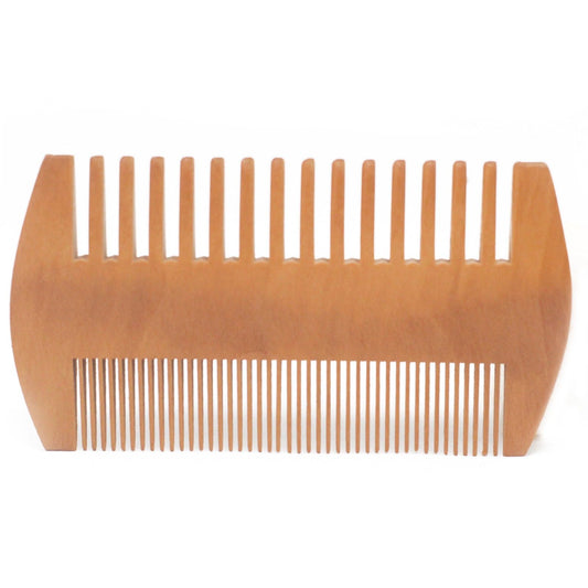Wooden comb on a white background