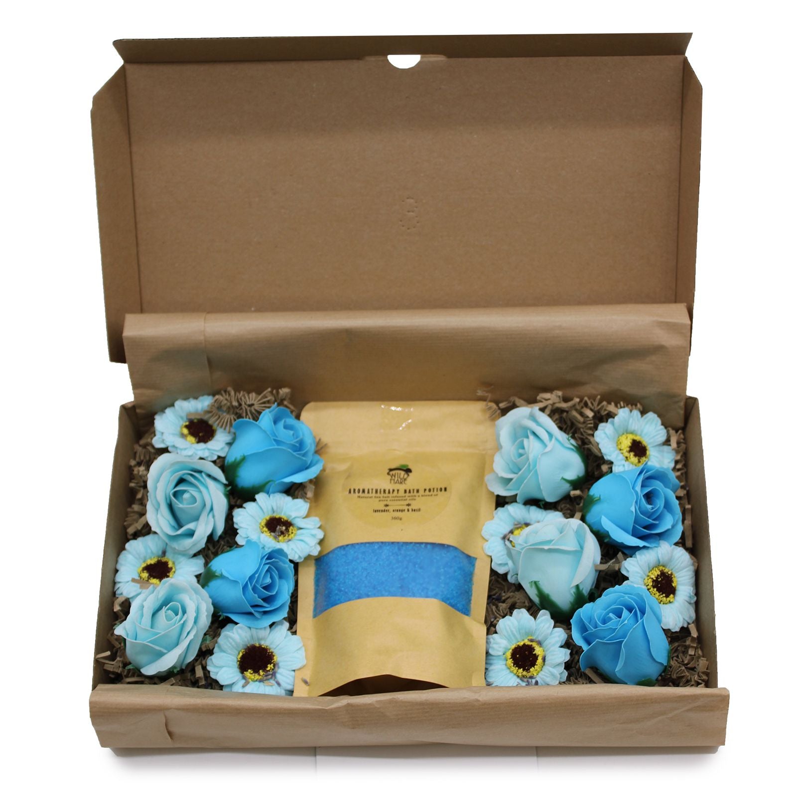 Open cardboard box with blue flowers and a yellow card inside