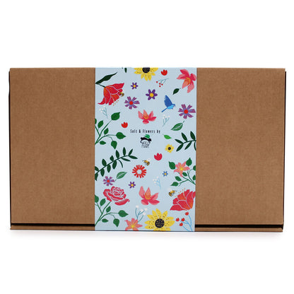 Floral-patterned box with a brown exterior on a white background