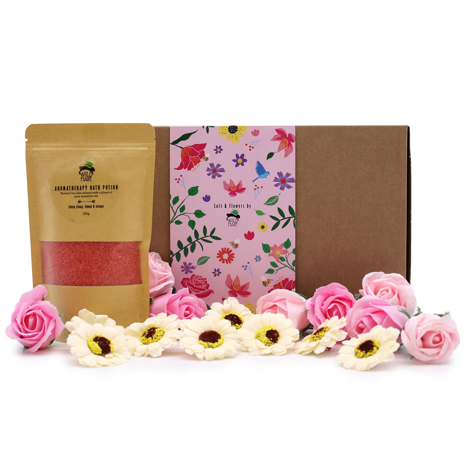 Product set with a brown package, pink floral towel, and decorative flowers on a white background