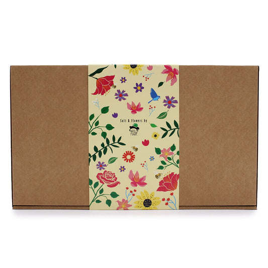 Floral-patterned box with a plain brown lid and base on a white background