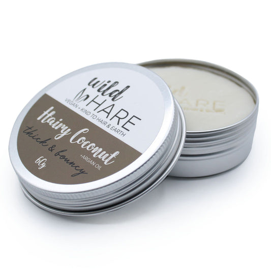 Tin of wild hare hair product on a white background