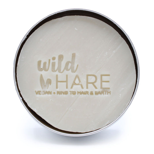 Round container with 'wild hare' branding on a white background