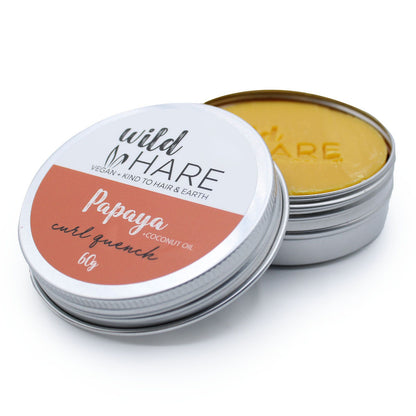 Wild Hare Papaya Coconut Oil curl quencher in a metal tin on a white background