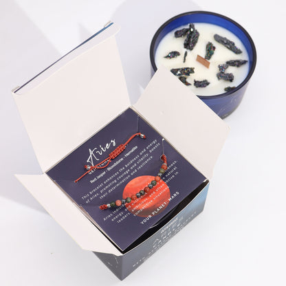 Zodiac Crystal Candle Aries with Gemstone Bracelet boxed is beautifully presented in a midnight blue glass jar adorned with silver-embossed star sign constellations. 